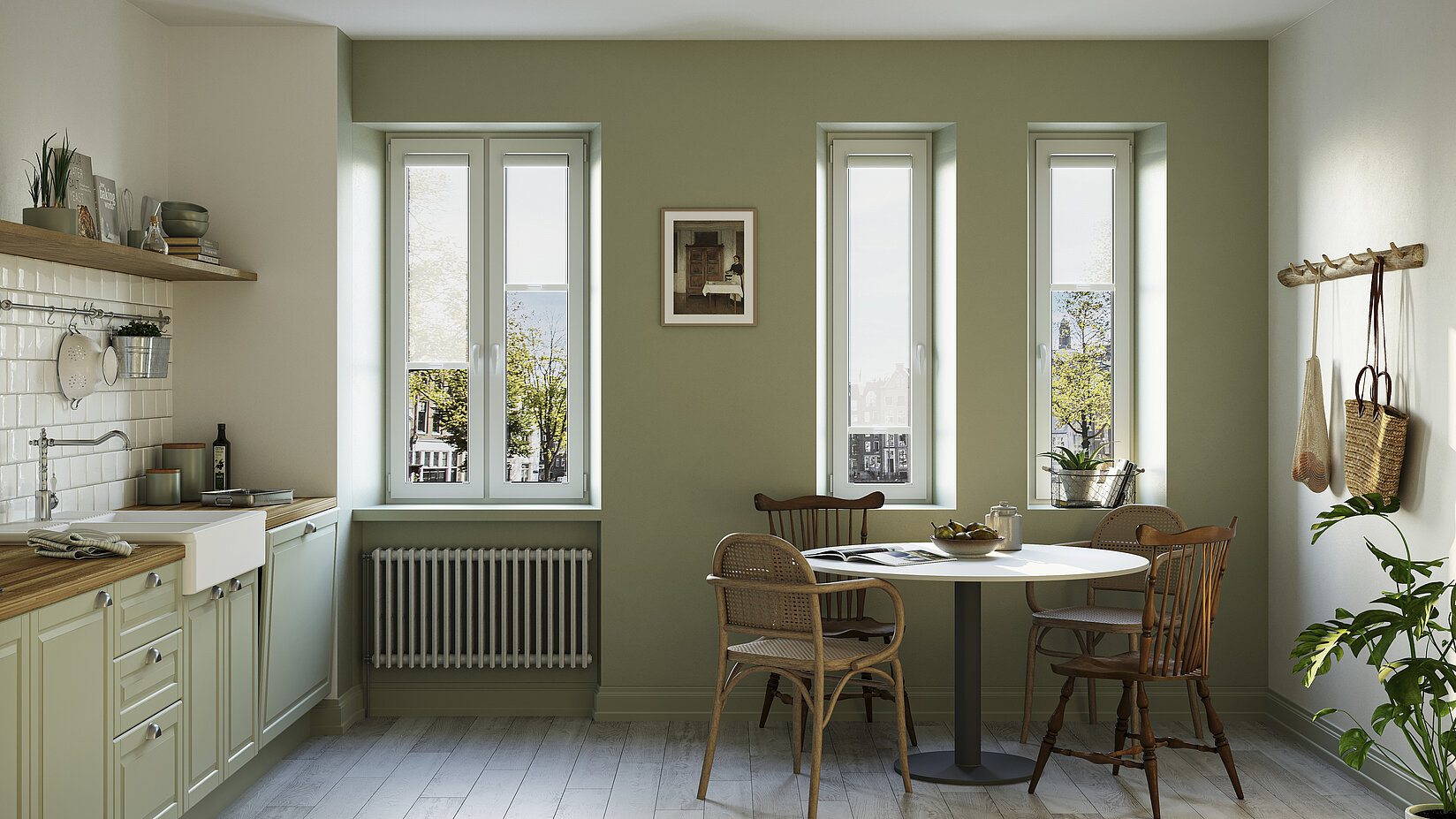 Skandinavisch eingerichtete Küche mit MHZ-Rollos vom Typ „Skiro“ als Sicht- und Sonnenschutz an drei Fenstern.